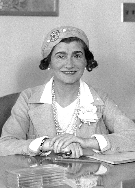 Coco Chanel wearing pearl necklace